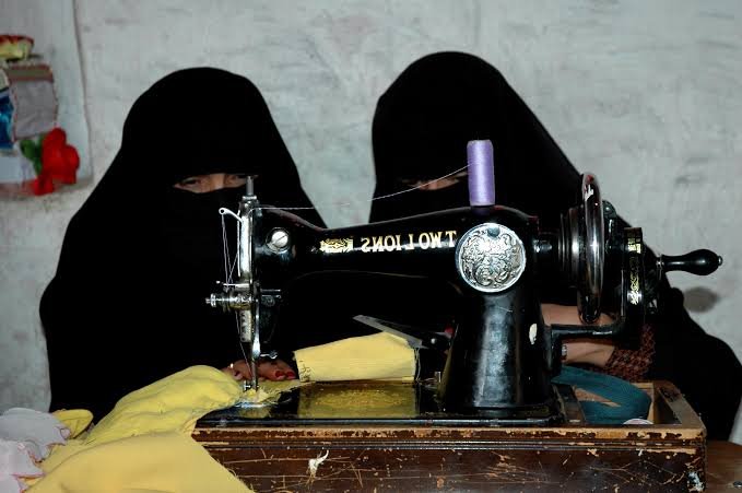 Women working together at a training table